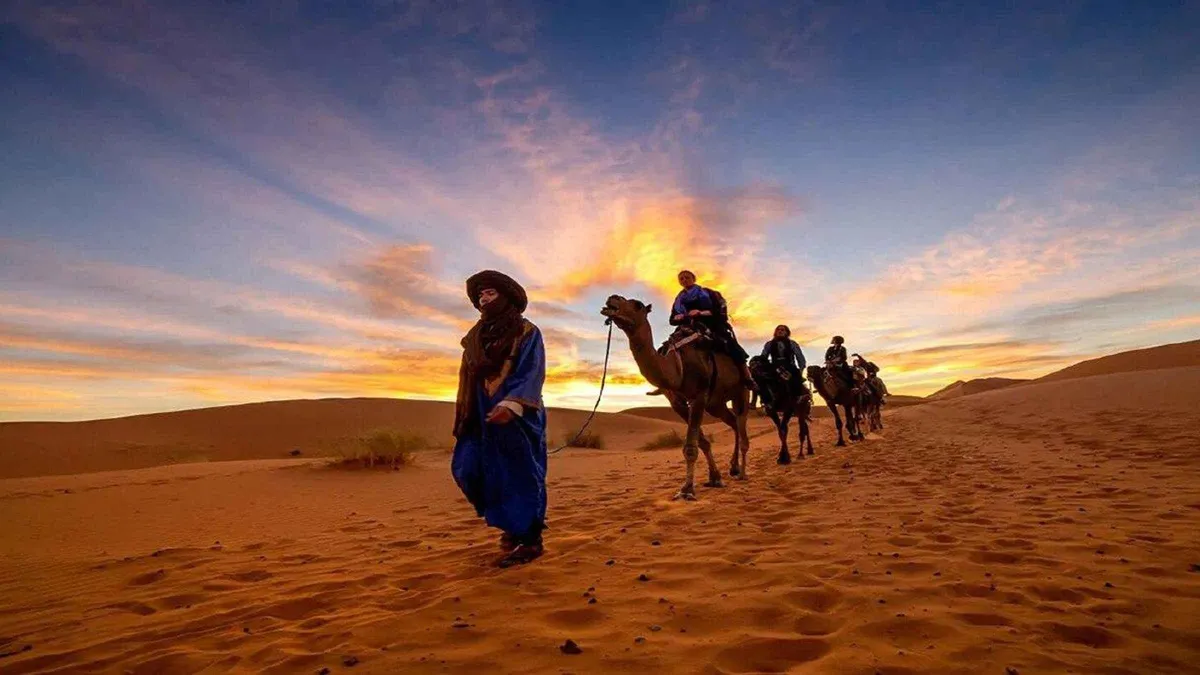 Erg Chebbi sand dunes at dawn on a 4-day desert Morocco tour package, Merzouga, Morocco