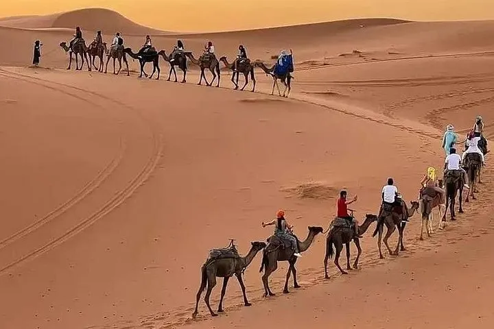 Luxury desert tent beside Sahara dunes on a 7-day Tangier to Marrakech Morocco tour package, Merzouga, Morocco