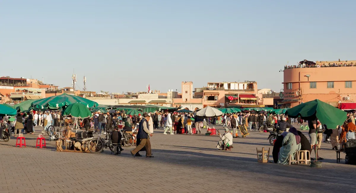 The Jemaa el-Fnaa square in Marrakech in late afternoon on a Morocco tour package, Jemaa el-Fnaa, Marrakech, Morocco